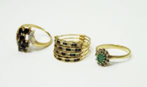 9ct gold emerald cluster ring, a gold-coloured sapphire cocktail ring (one missing),