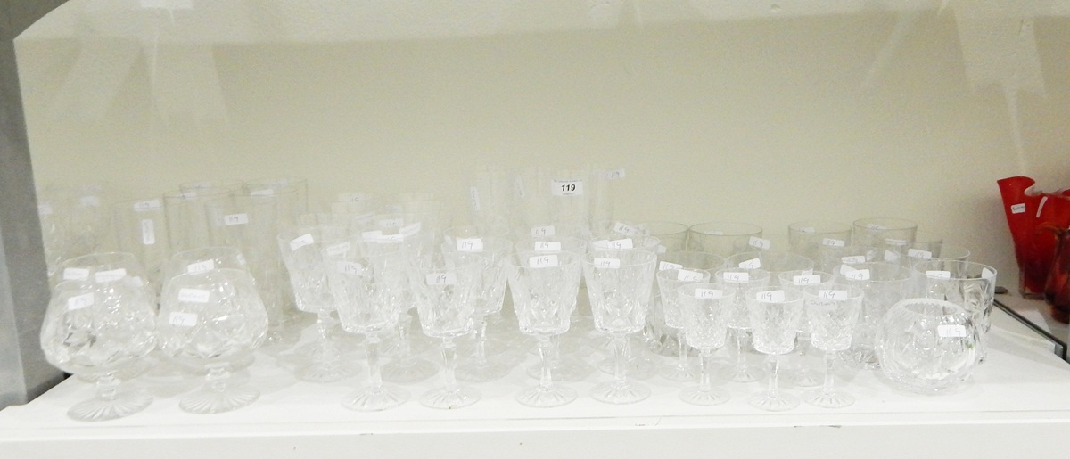 Large suite of glasses including water tumblers, brandy balloons, wines, sherries, flutes, ashtray,