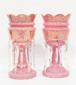 Pair of Victorian pink glass lustres decorated with white enamel and gilding (three lustres