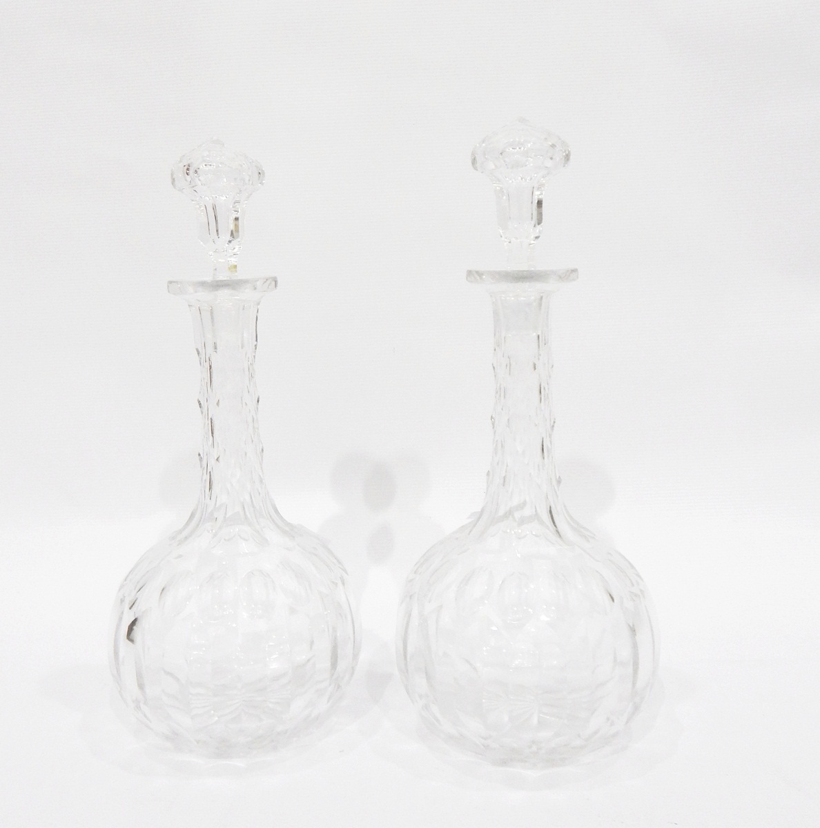 Pair of cut glass decanters,