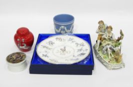 Unter Weiss Bach porcelain figure group of young girl and boy playing pan pipes by sheep with leaf