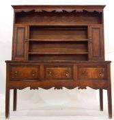 Late 19th century oak and mahogany banded dresser, the upper section with flat moulded cornice,