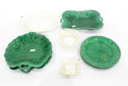 Quantity of Wedgwood green glazed leaf-moulded dishes and a quantity of cream pottery basket-shaped