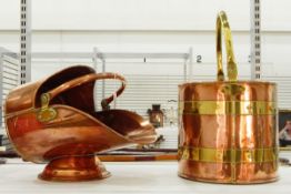 Copper coal scuttle and a copper coal bucket with brass bands and swing handle (2)