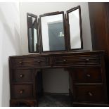 Three-piece bedroom suite comprising two-door double wardrobe with linenfold panels,