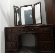 Three-piece bedroom suite comprising two-door double wardrobe with linenfold panels,