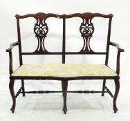 19th century mahogany settee, the twin back with two pierced splats, with outswept arms,