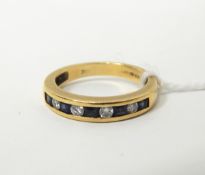 18ct gold diamond and sapphire half eternity ring,