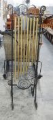 Set of 'Royal Home Chimes' comprising of eight graduated brass cylindrical chimes in a wrought iron