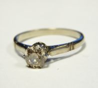 White metal solitaire diamond ring, the old cut diamond measuring approx. 5.4mm across and 2.