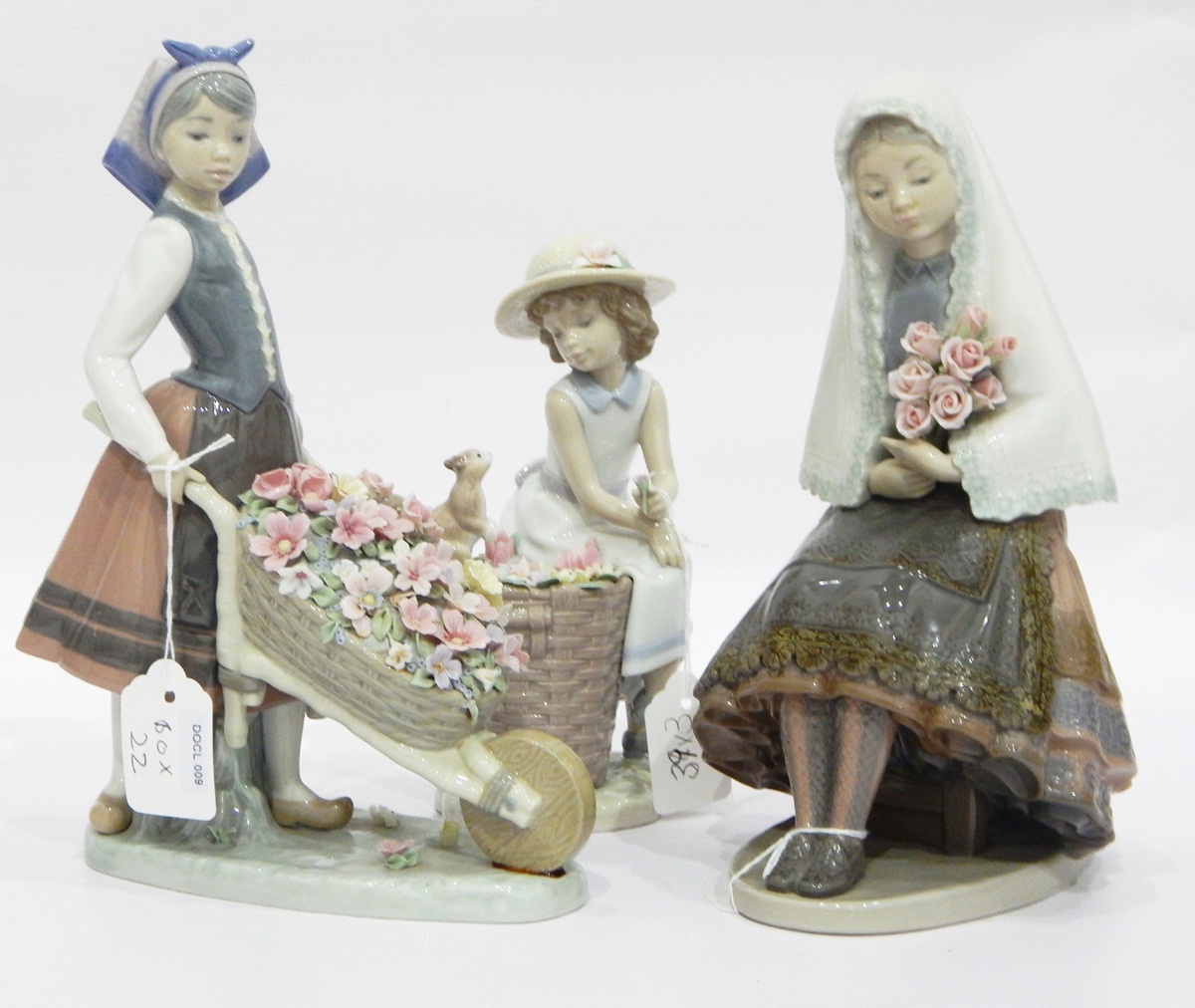 Lladro models of a Spanish dressed girl holding flowers, - Image 2 of 2