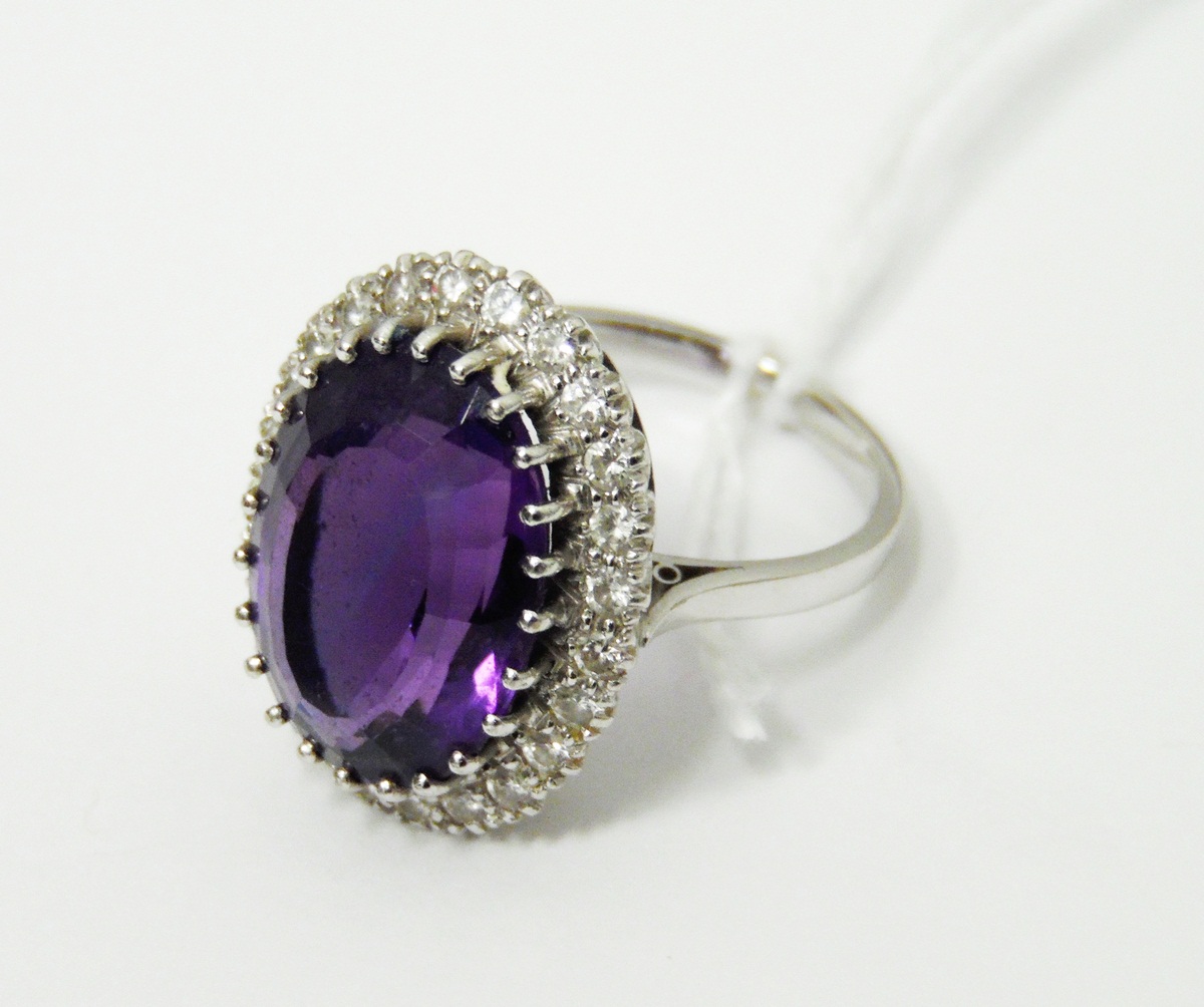 White gold-coloured amethyst and diamond cluster ring,