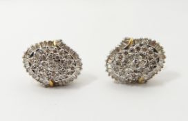 Suite of gold-coloured diamond set jewellery comprising a cocktail ring,