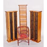 Three CD racks and a child's cane tub chair (4)