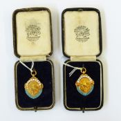 Two enamelled 9ct gold cycling medals,