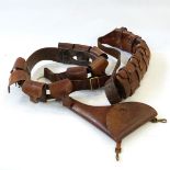 WWI leather pistol holster and belt, a leather ammunition belt and a second leather and canvas