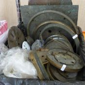 Quantity of assorted clock parts including enamel, ivorine and other clock dials, brass clock