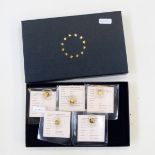 Four Windsor Mint 14ct gold proof coins, each 11mm diameter and weighing 0.5g, comprising one