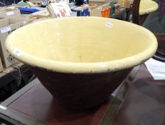 Large ceramic dairy bowl with yellow glazed interior