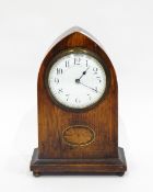 Edwardian oak mantel clock, the circular enamel dial with Arabic numerals,