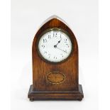 Edwardian oak mantel clock, the circular enamel dial with Arabic numerals,