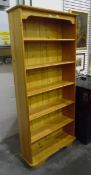 Modern pine six-shelf bookcase,