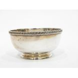 Silver bowl by C J Vander Limited, London 1958, of circular form with stiff leaf border,