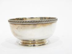 Silver bowl by C J Vander Limited, London 1958, of circular form with stiff leaf border,