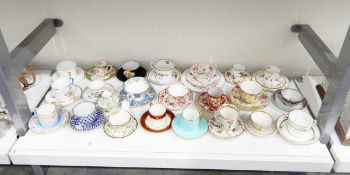 Various early 20th century teacups and saucers to include a Minton coffee can,