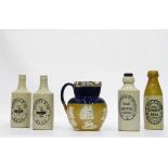 Royal Doulton stoneware jug with silver mount to rim and four stoneware bottles (5)