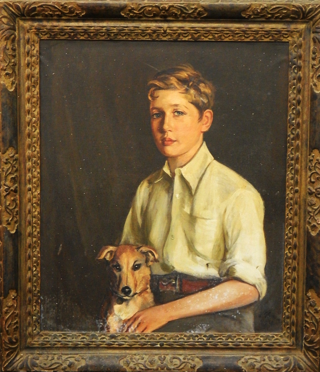 Unattributed (early 20th century school) Oil on canvas Half-length portrait of a young boy holding