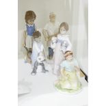 Lladro figure of a little girl holding two puppies,