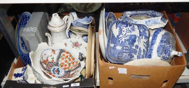 Large quantity of blue and white china including serving dishes, meat plates, etc.