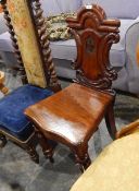 19th century mahogany hall chair with moulded and carved shield-shaped back,