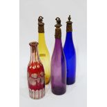 Three Victorian coloured glass wine decanters, blue,