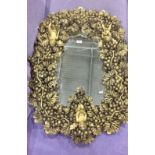 Mirror within a moulded fruiting vine high relief moulded frame