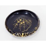 Early 20th century Japanese lacquer bowl of circular form, decorated with gilt prunus blossom,