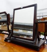 Two mahogany swing framed toilet mirrors (2)