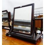 Two mahogany swing framed toilet mirrors (2)