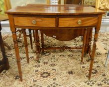 Georgian cross-banded mahogany side table fitted two drawers to frieze with circular brass handles