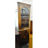 Georgian-style walnut double corner cupboard with straight moulded corners,