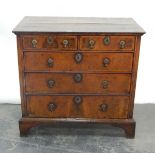 Early 18th century walnut veneered and cross-banded chest of two short and three long drawers,