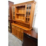 Modern cherrywood kitchen dresser, the upper section with open shelves,