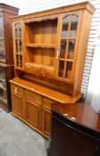 Modern cherrywood kitchen dresser, the upper section with open shelves,