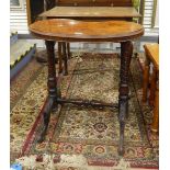 Victorian burr walnut kidney-shaped writing table on turned and baluster columns,