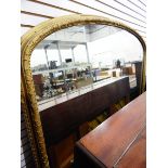 Large Victorian overmantel mirror in a moulded gilt frame,