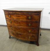 George III mahogany bowfront chest of drawers, the brushing slide over three long drawers,