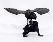 Japanese bronze model of an eagle preying on a monkey,