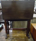 Mahogany Sutherland table with undershelf, on twin pedestal support,