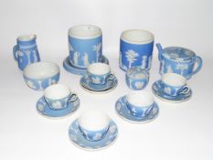 Quantity of 19th century Wedgwood pale blue jasperware to include teapot, teacups and saucers, jugs,